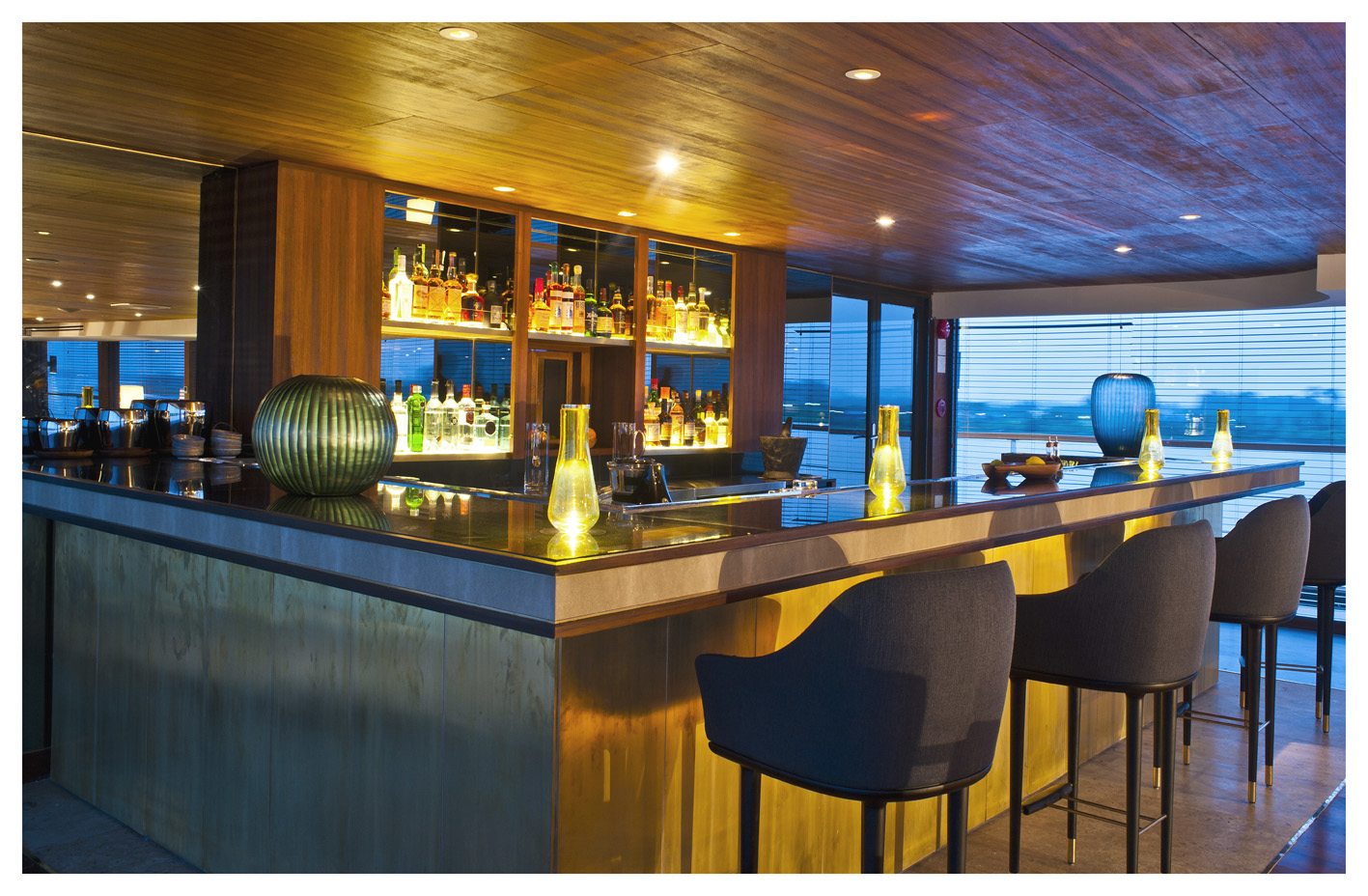 Aqua Expeditions Aqua Mekong Indoor Lounge Bar.jpg