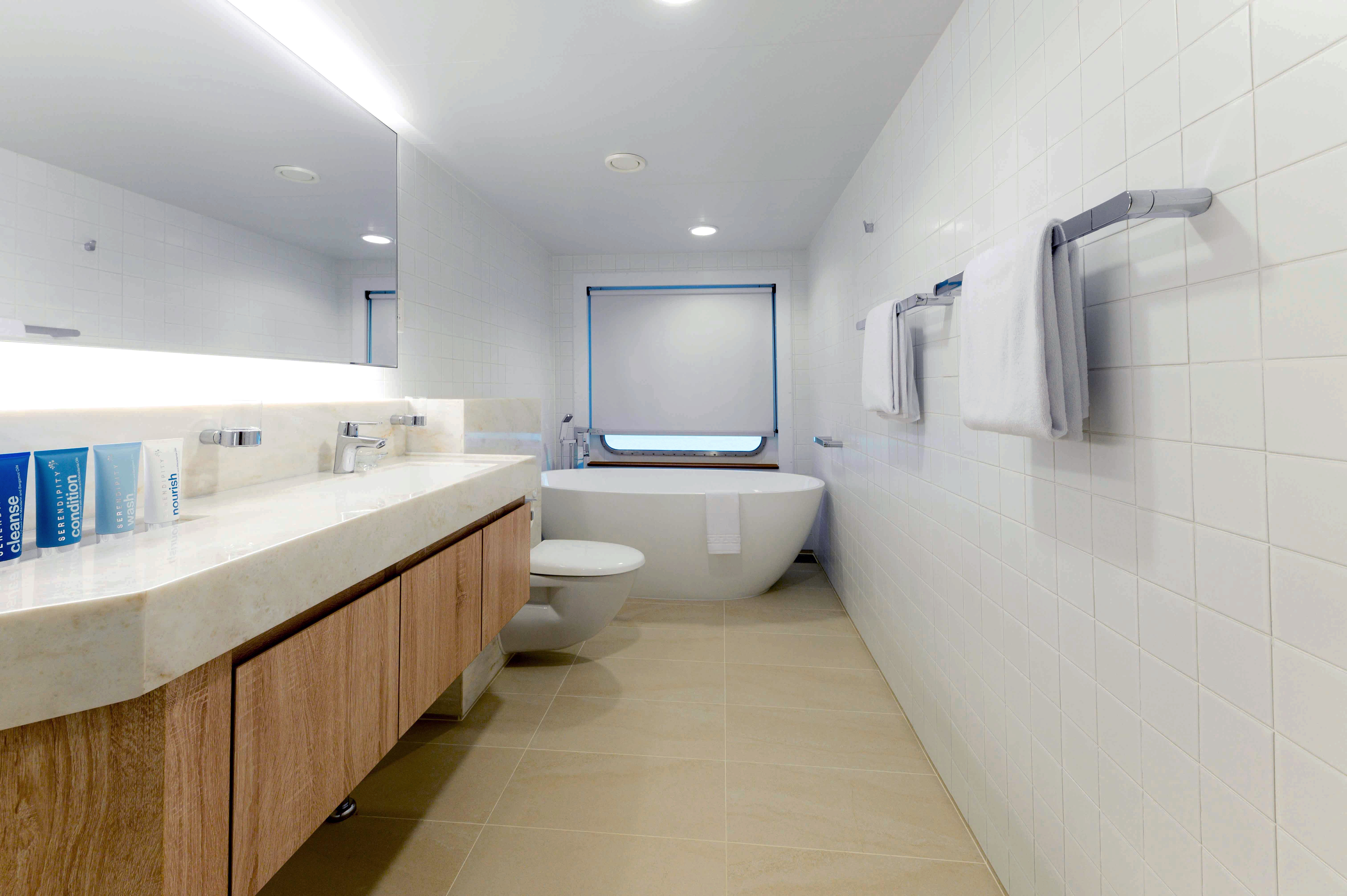 Coral Expeditions - Coral Adventurer - Accommodation- Bridge Deck Balcony Suite _3_.jpg