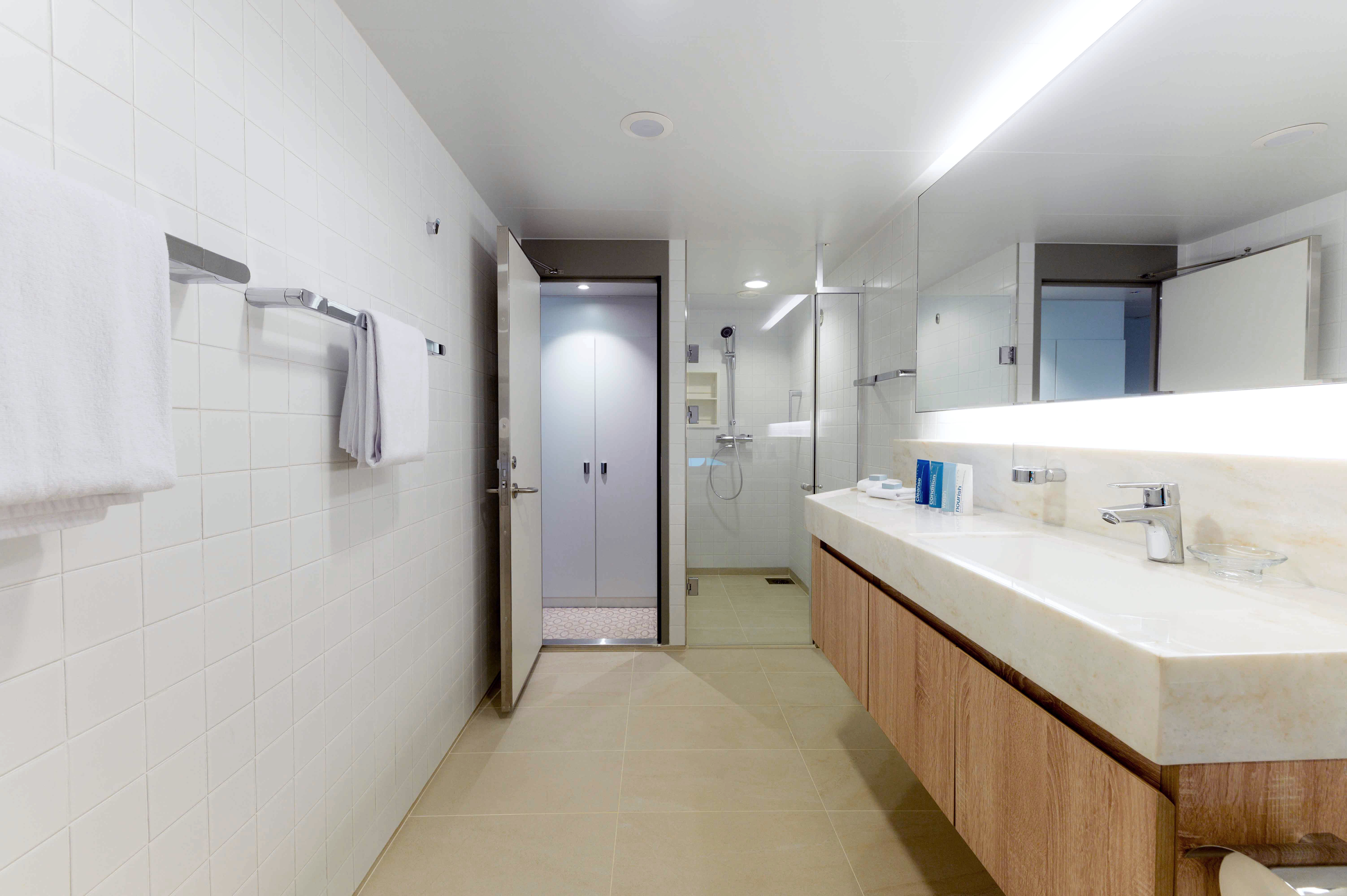 Coral Expeditions - Coral Adventurer - Accommodation- Bridge Deck Balcony Suite _4_.jpg