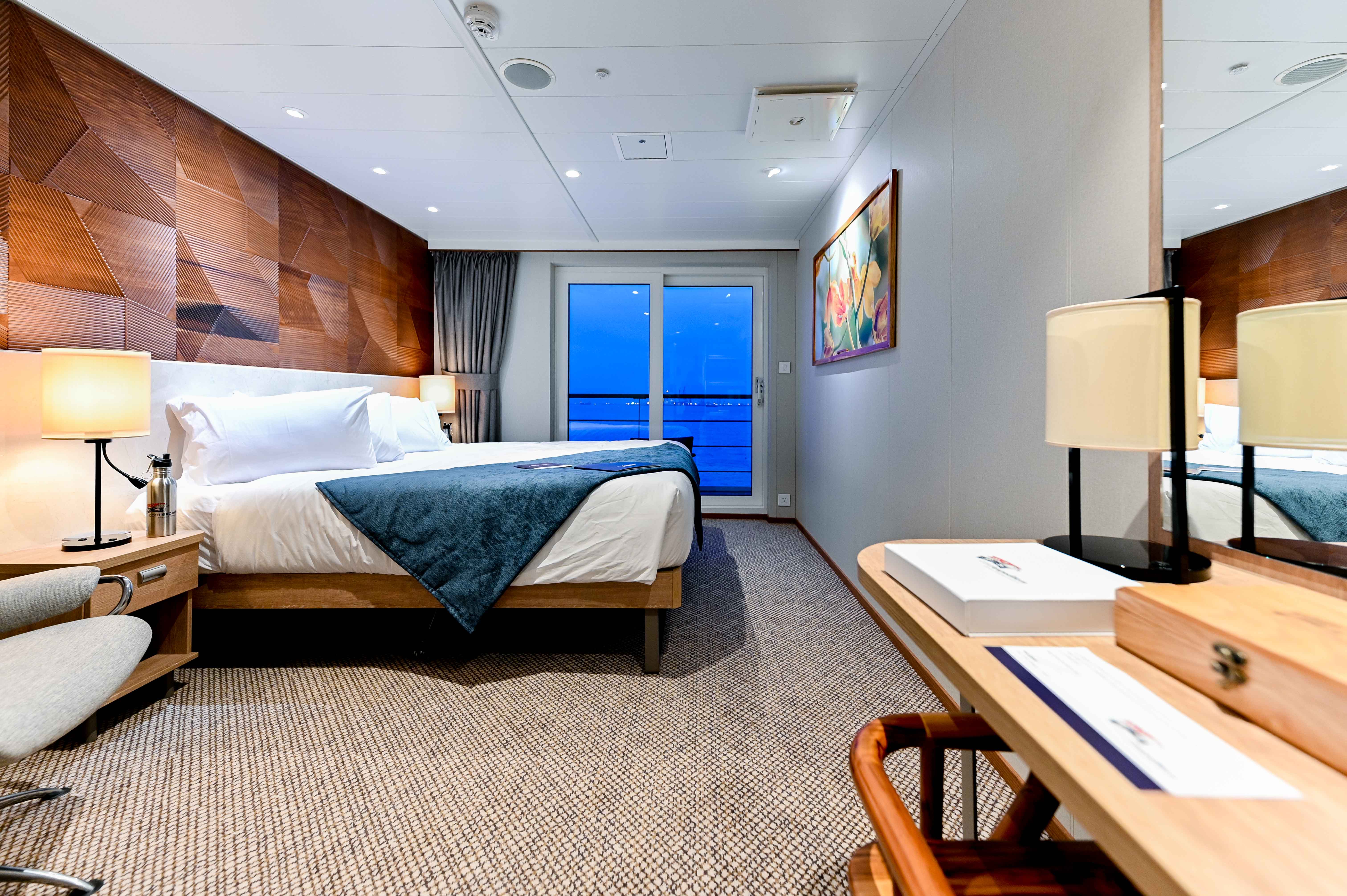 Coral Expeditions - Coral Adventurer - Accommodation - Bridge Deck Balcony Suite 2 _3_.jpg