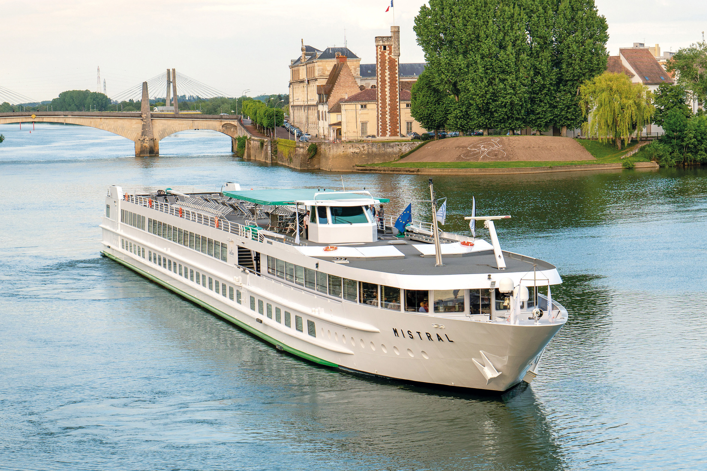 All the must-see sites on the Rhône between Lyon, Provence, and the Camargue with a dinner at Paul Bocuse's Abbaye de Collonges Restaurant OFFERED (port-to-port cruise)