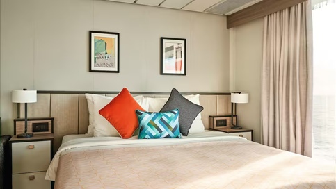 Marella Cruises, Marella Discovery Deluxe Cabin Bedroom.jpg